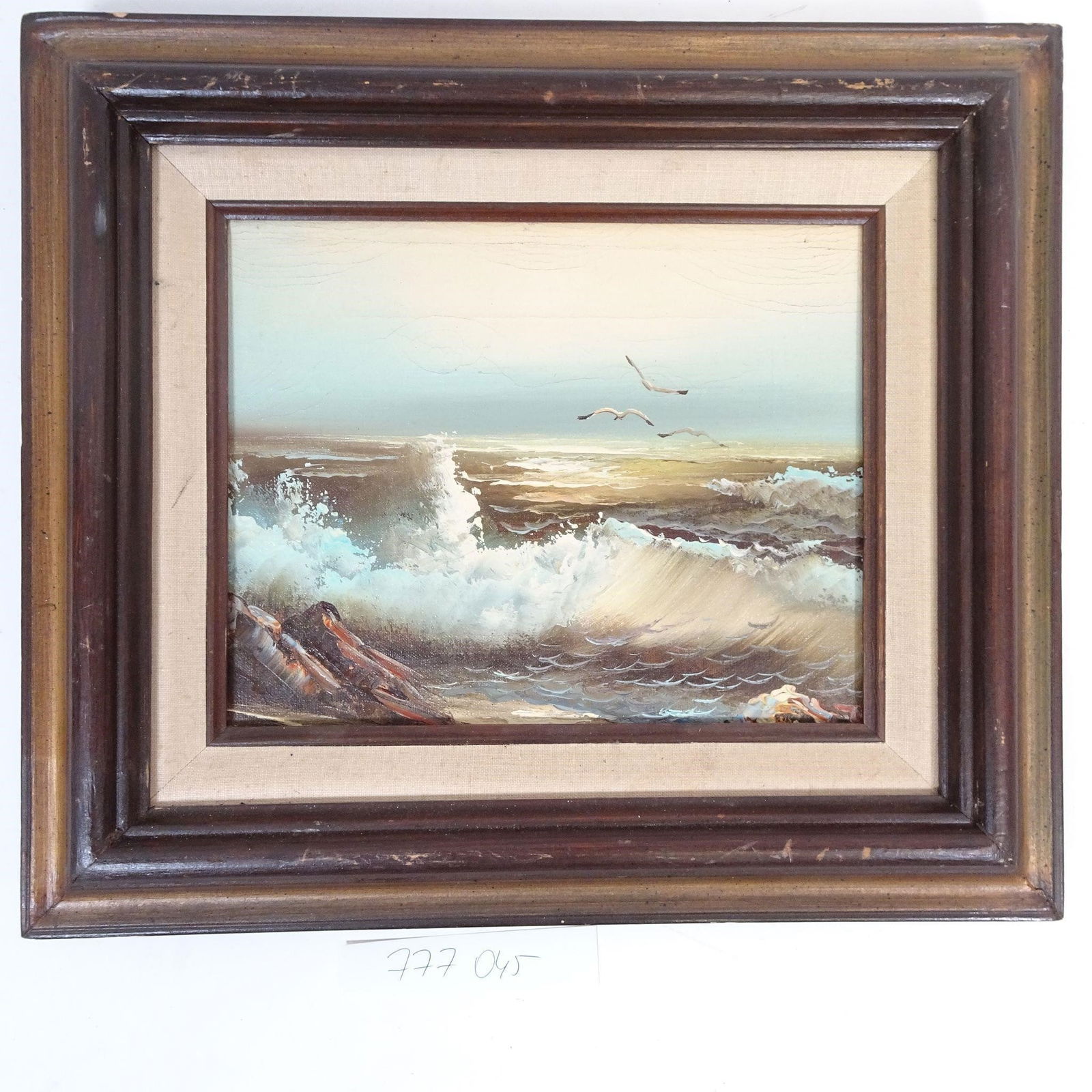 Seascape with Waves and Seagulls: Original oil painting on canvas depicting a dramatic seascape with crashing waves and seagulls flying above the water. The artwork features a muted, natural color palette of blues, tans, and earthy to