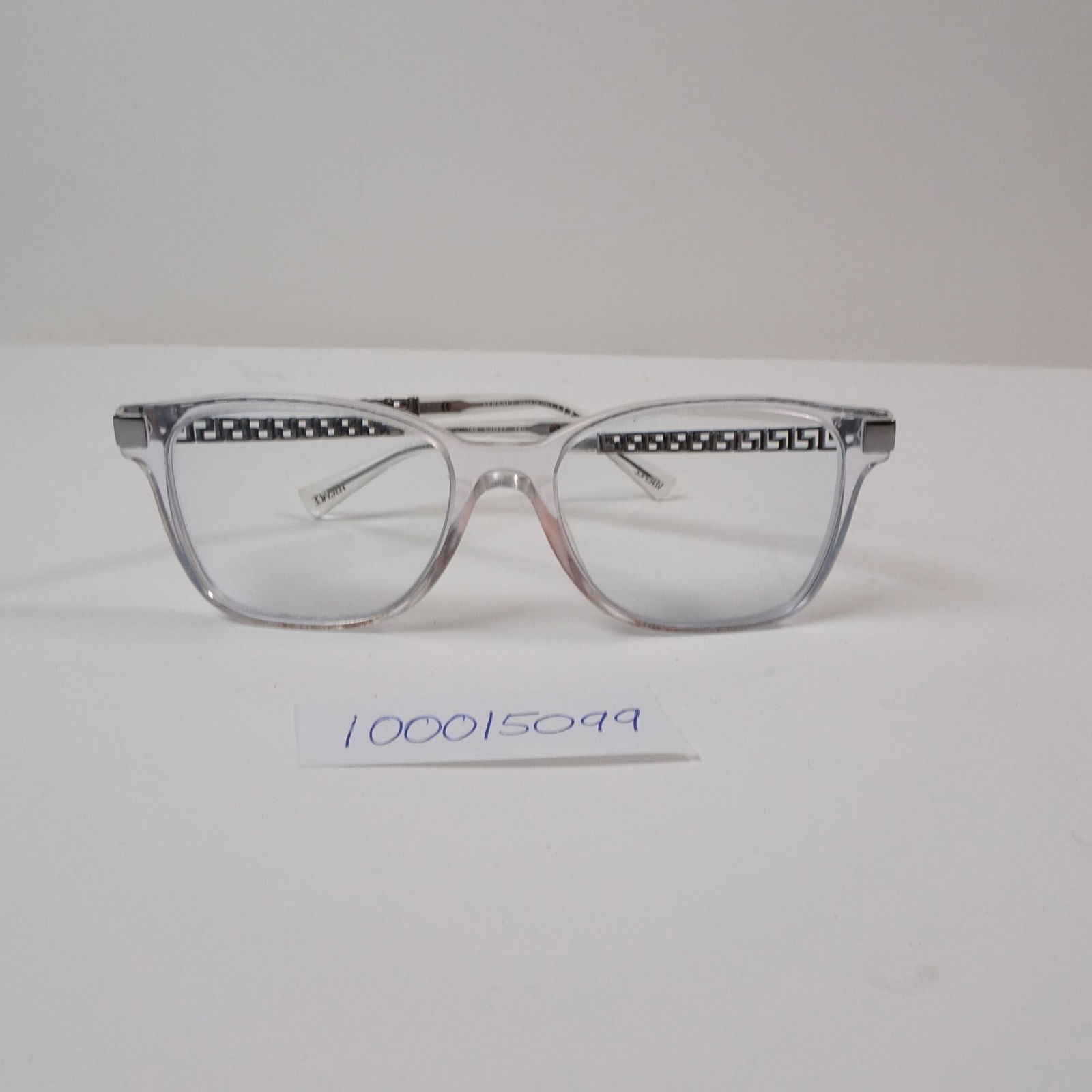 Versace Clear Glasses: Versace clear glasses. Stylish designer eyewear featuring iconic Versace detailing, perfect for fashion-forward wear or collection. Condition varies; please refer to photos for details.Sold as-is. No