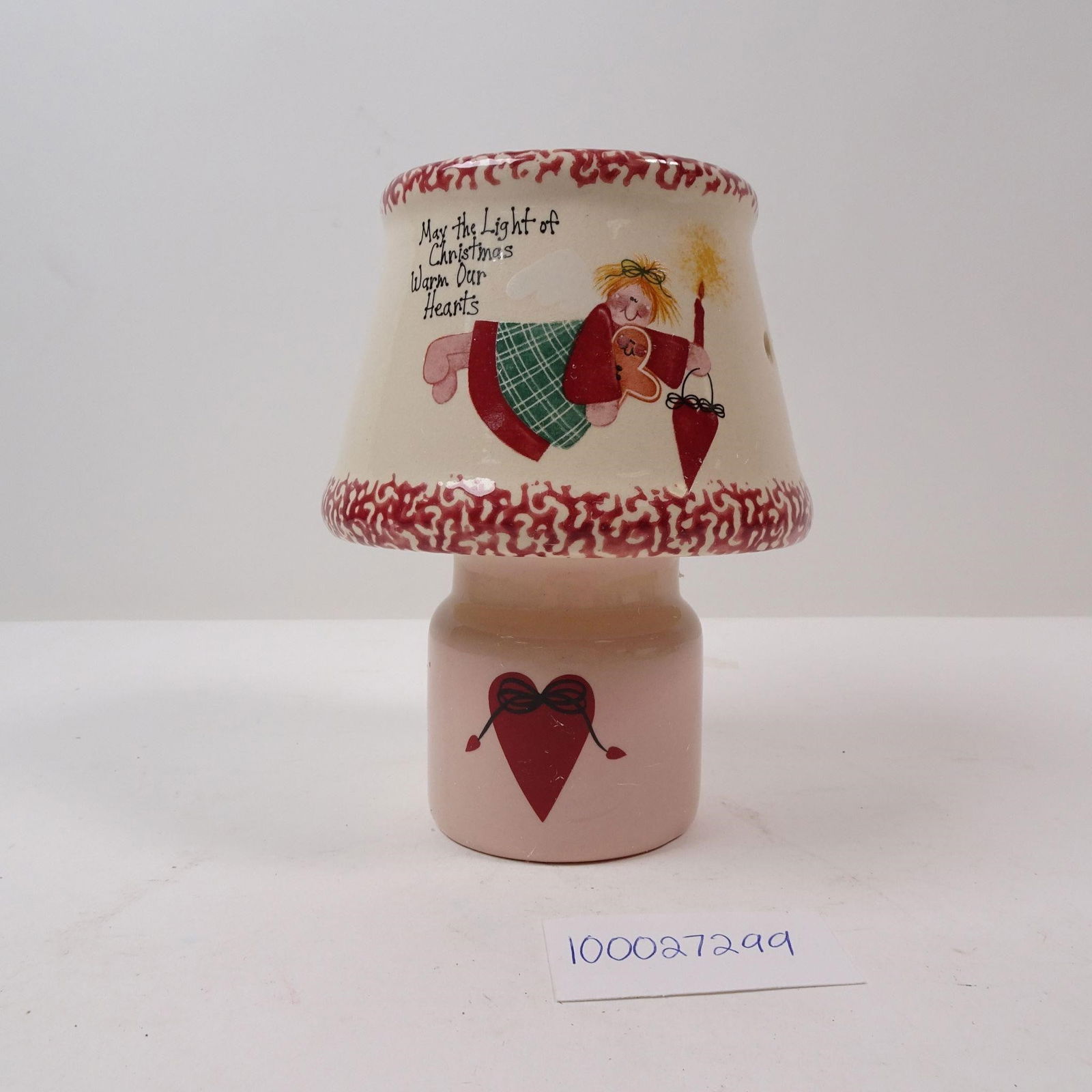Vintage Ceramic Christmas Candle Lamp Cinnamon: A decorative vintage ceramic Christmas candle lamp, originally designed to evoke the warm scent of cinnamon. This charming piece is perfect for collectors of vintage holiday dÃ©cor or for adding a t