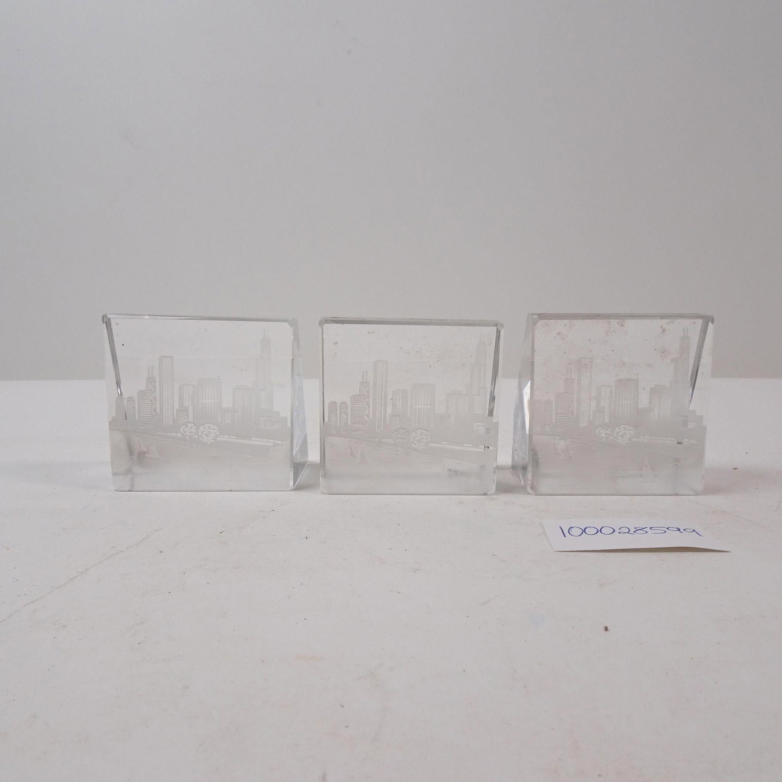 Chicago Skyline Mirrored Prism Set of 3: A decorative prism featuring the iconic Chicago skyline with a unique mirrored effect. This piece is perfect for a collector of city memorabilia, adding a touch of sophisticated, urban charm and a str