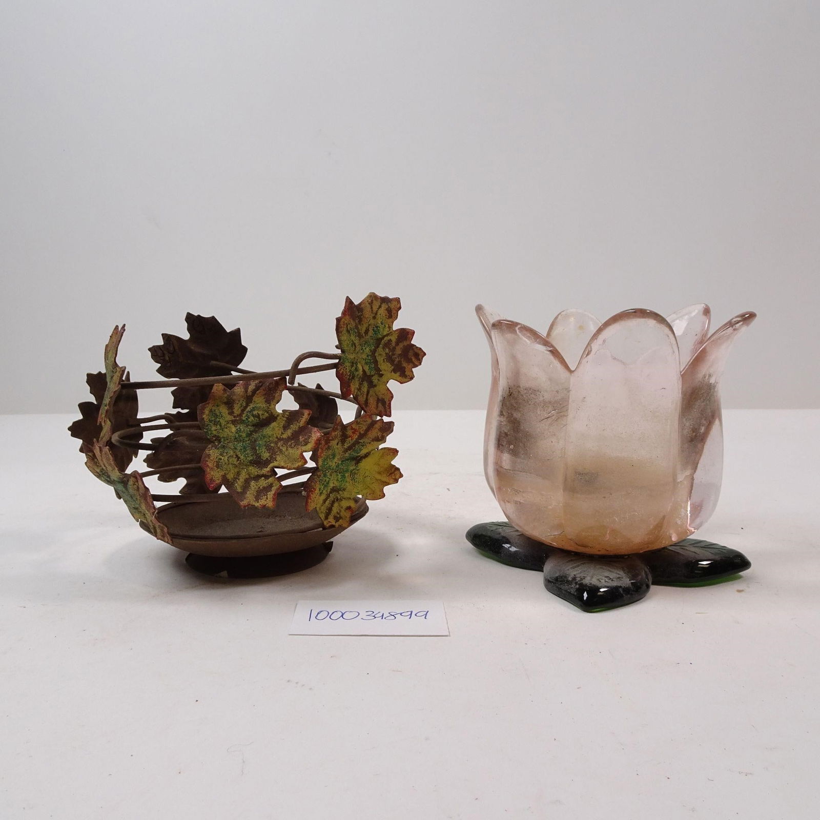 Decorative Candle Holders: Tulip Shaped &Fall Leaf: A decorative set of candle holders, featuring a whimsical tulip shape and a cozy fall leaf design. These pieces are perfect for seasonal decorating, adding a touch of nature-inspired charm and ambient