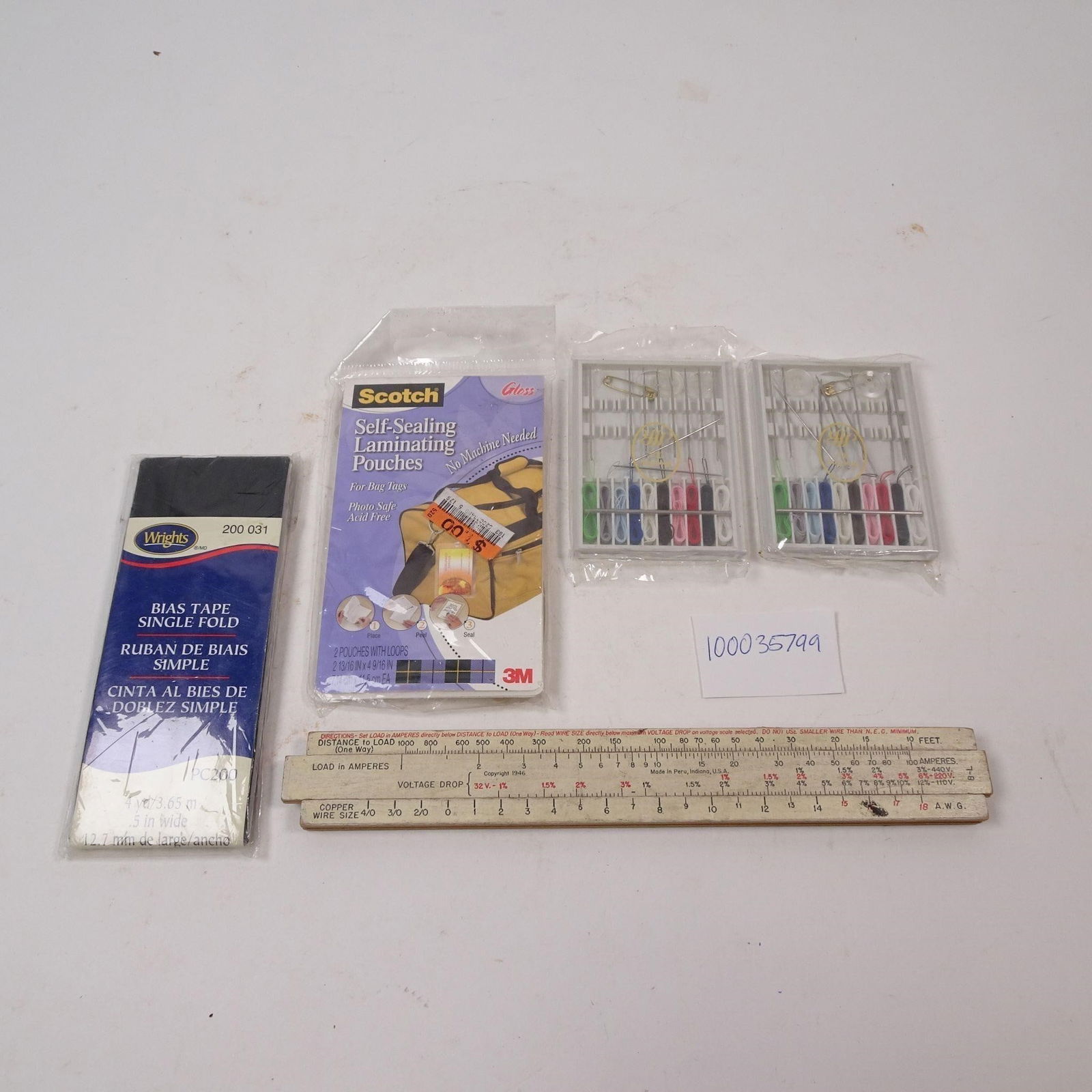 Sewing Kit: Threds, Bias Tape, Self Sealing Tape: A practical sewing kit assortment featuring threads, bias tape, and self-sealing tape. This versatile collection contains essential materials perfect for crafting, clothing repair, and various home se