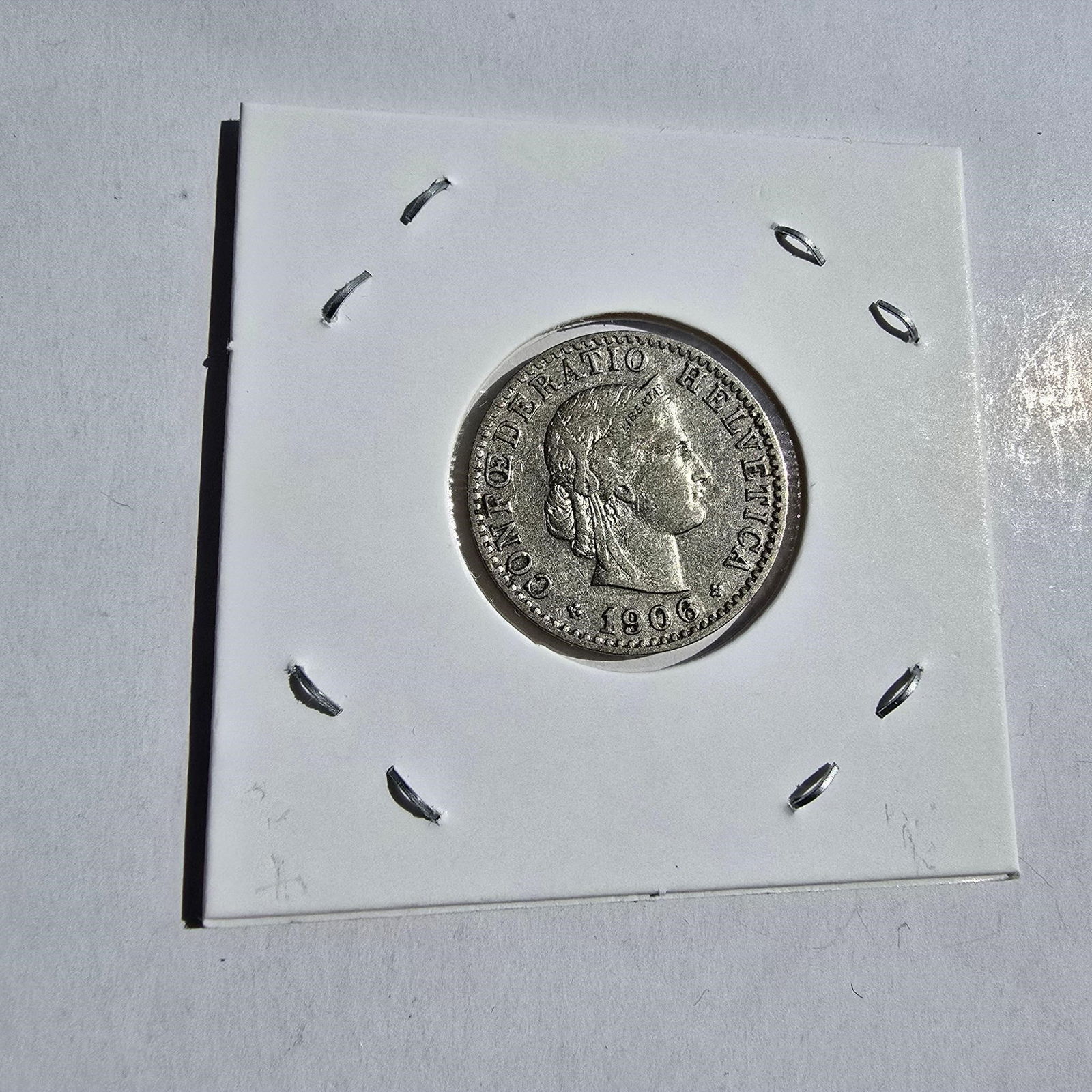 1906 Switzerland 20 Rappen Silver Coin: 1906 Switzerland 20 Rappen Silver Coin - Helvetia - 0.835 SilverCountry: SwitzerlandYear: 1906Denomination: 20 RappenComposition: 0.835 silverWeight: 2 gDiameter: 21 mmCondition: Circulated (see photo