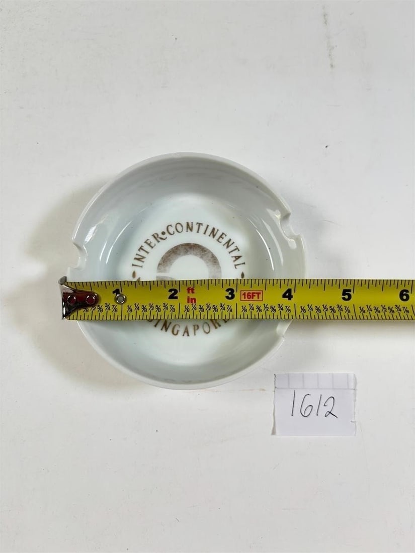 Collectible Intercontinental Hotel Singapore White Ceramic Ashtray: Collectible Intercontinental Hotel Singapore White Ceramic Ashtray â?? Elegant white ceramic ashtray featuring the Intercontinental Hotel Singapore branding. A great addition for collectors. Please r