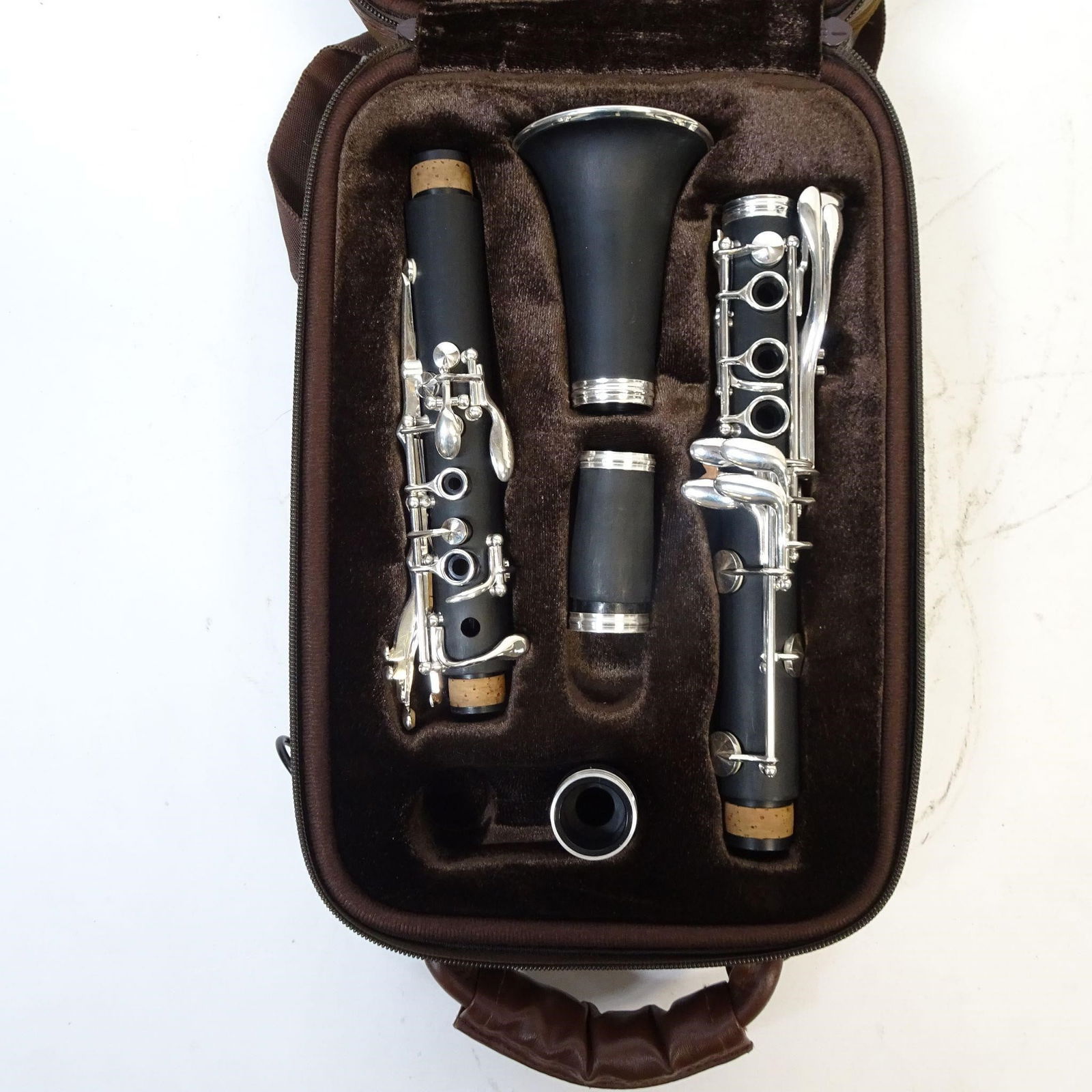 B.A.C Musical Instruments Apprentice Bb Clarinet: For sale is a B.A.C Musical Instruments Apprentice Bb clarinet, a well-regarded student-level instrument, commonly used in school band programs. The clarinet features a black composite body with