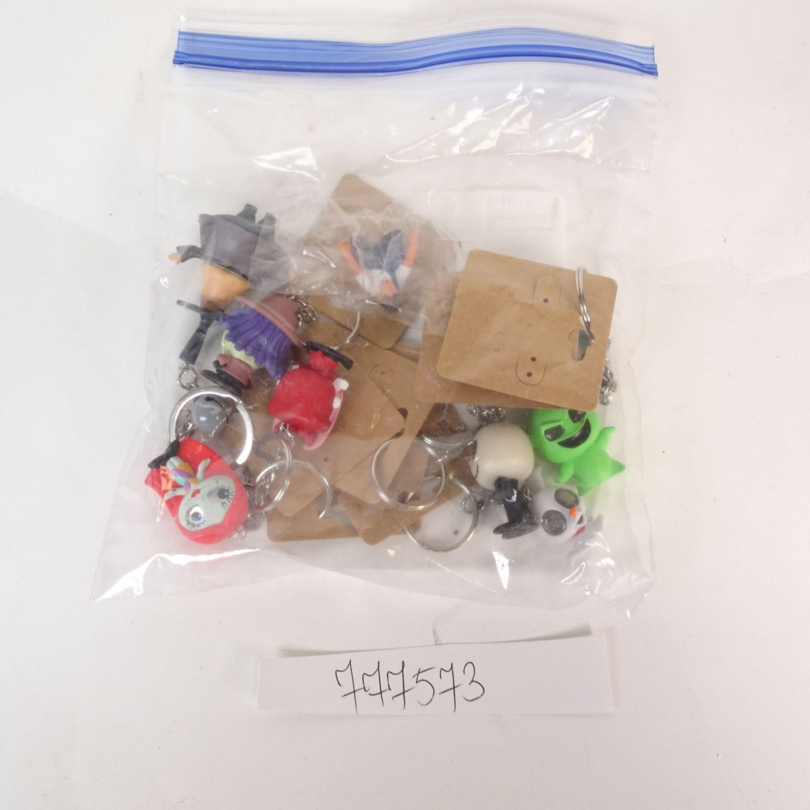 Keychains Collector Lot: A collector lot of keychains featuring Halloween-themed characters and designs inspired by Disney's The Nightmare Before Christmas. Condition: Very good - unused or lightly stored. Sold as one