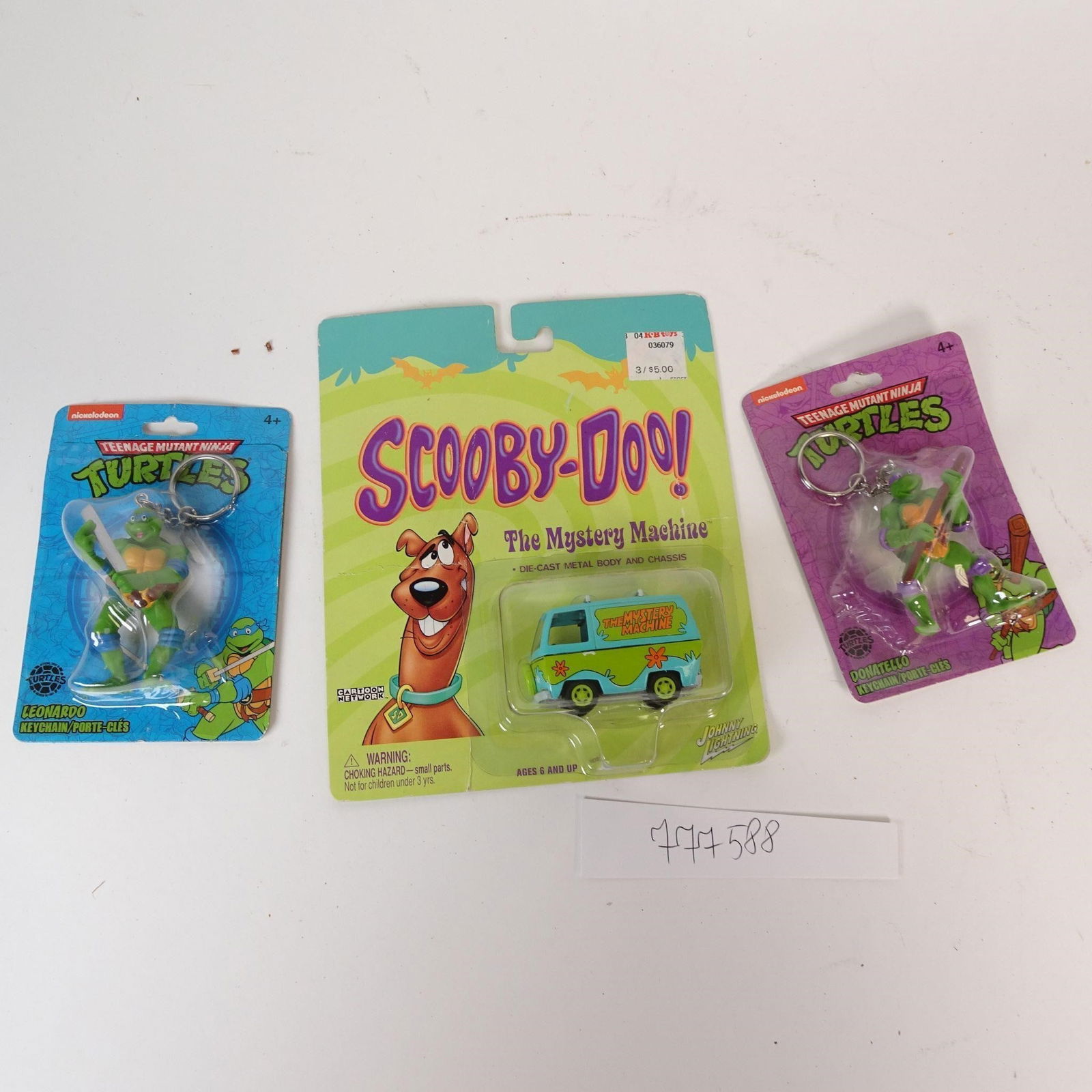 pop-culture lot: Fun and collectible pop-culture lot featuring iconic characters from classic animated series. All items are new and sealed in original packaging, showing light shelf wear consistent with age. Great