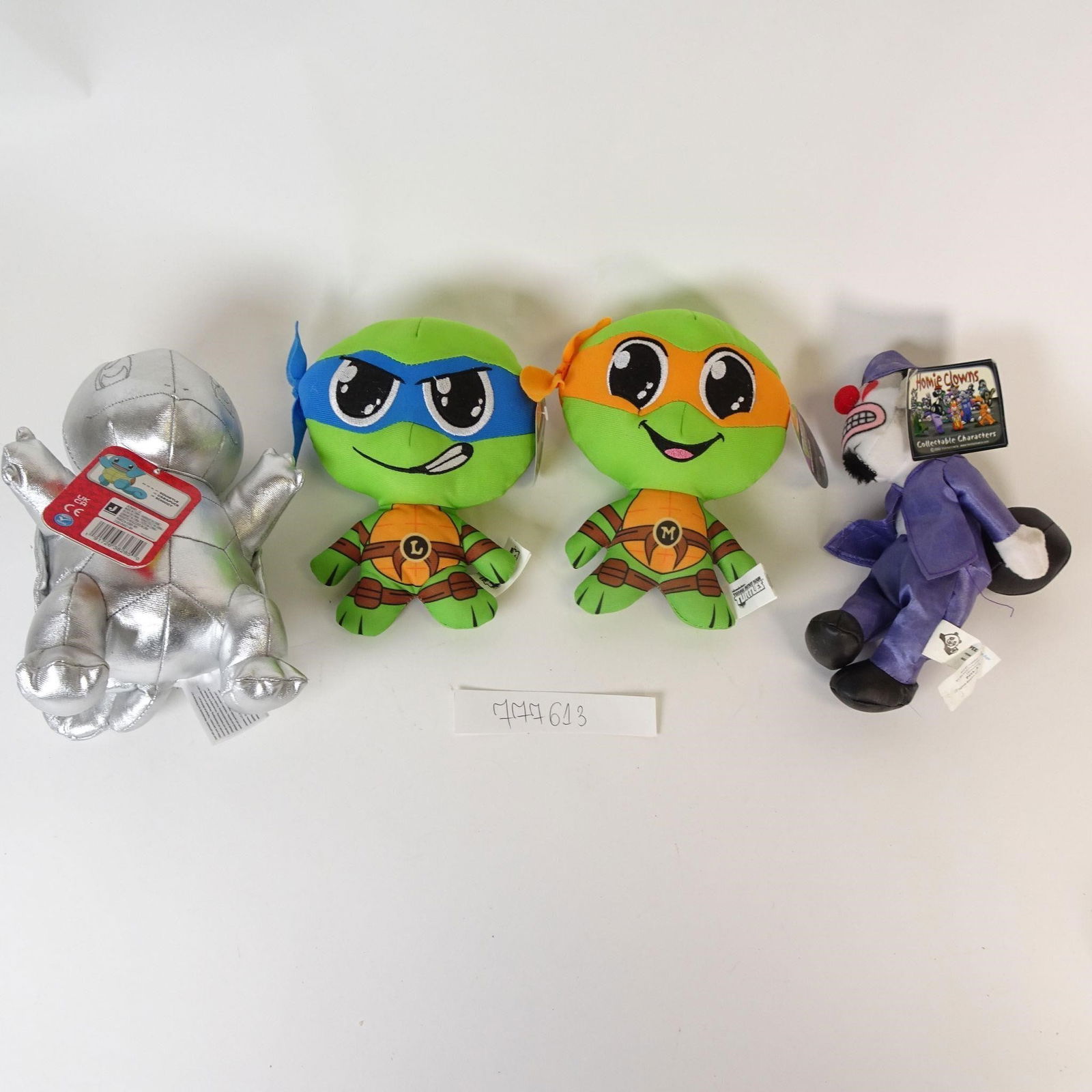 Plush Toy Lot (4): This fun mixed lot includes four plush toys, featuring popular Teenage Mutant Ninja Turtles characters along with unique novelty plush figures. Great for kids, TMNT fans, collectors, party d?©cor,