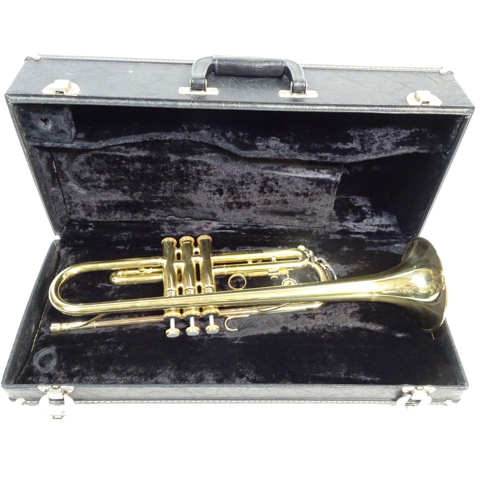 Holton Bb Trumpet: Vintage Holton Bb trumpet in classic brass finish. Instrument is complete and comes with a hard protective case. The trumpet shows normal cosmetic signs of use consistent with age (light surface