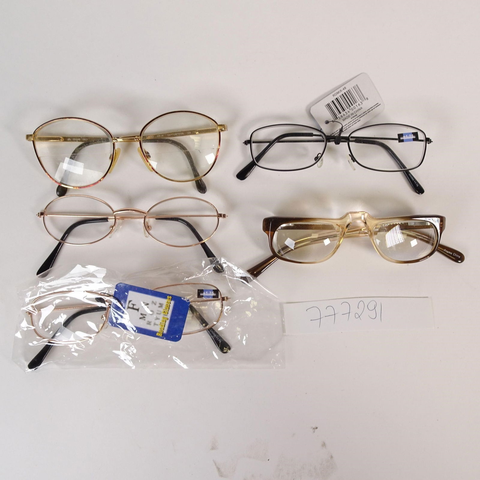 Mixed Lot of Reading Glasses: Mixed lot of several pairs of reading glasses in various styles and strengths. Some pairs include original tags (+1.75, +2.00 visible on select items). Pre-owned / storage condition with minor wear
