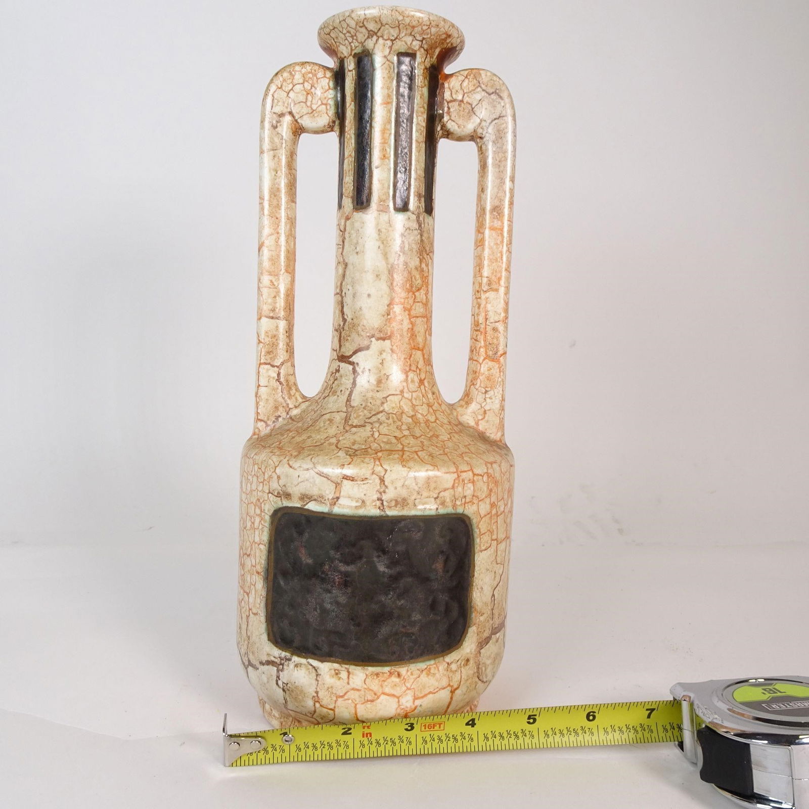 Vintage Crackle Glaze Ceramic Vase, Handles: Decorative ceramic vase with crackle glaze finish. Features two handles and textured panel detail. Approx. 9 inches tall. Ideal for vintage or rustic interiors.