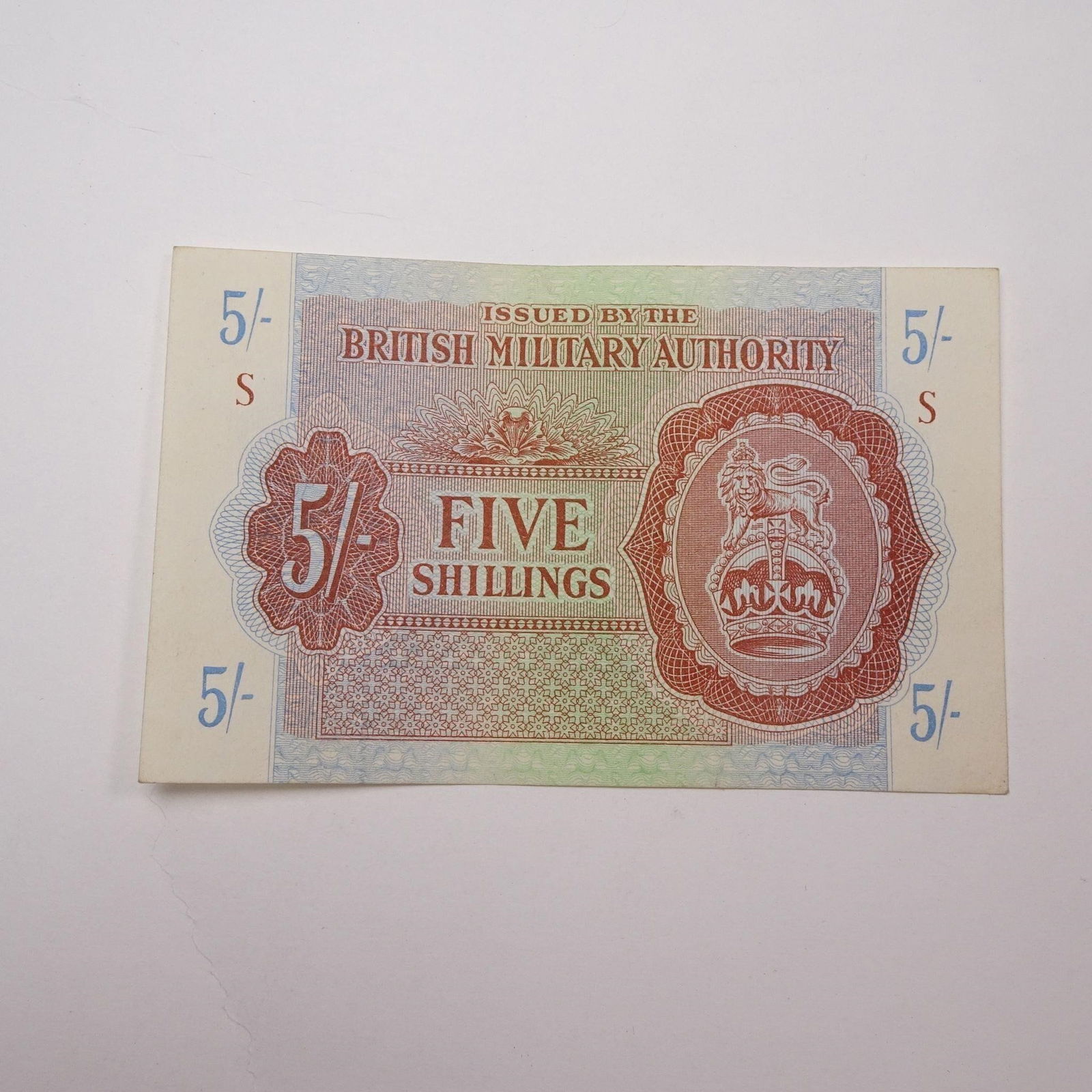 British Military Authority - 5 Shillings 1942-1947: British Military Authority - 5 Shillings Banknote (1942-1947)WWII-era military-issued currency used by British forces. A collectible piece of wartime history.Condition varies; please refer to photos