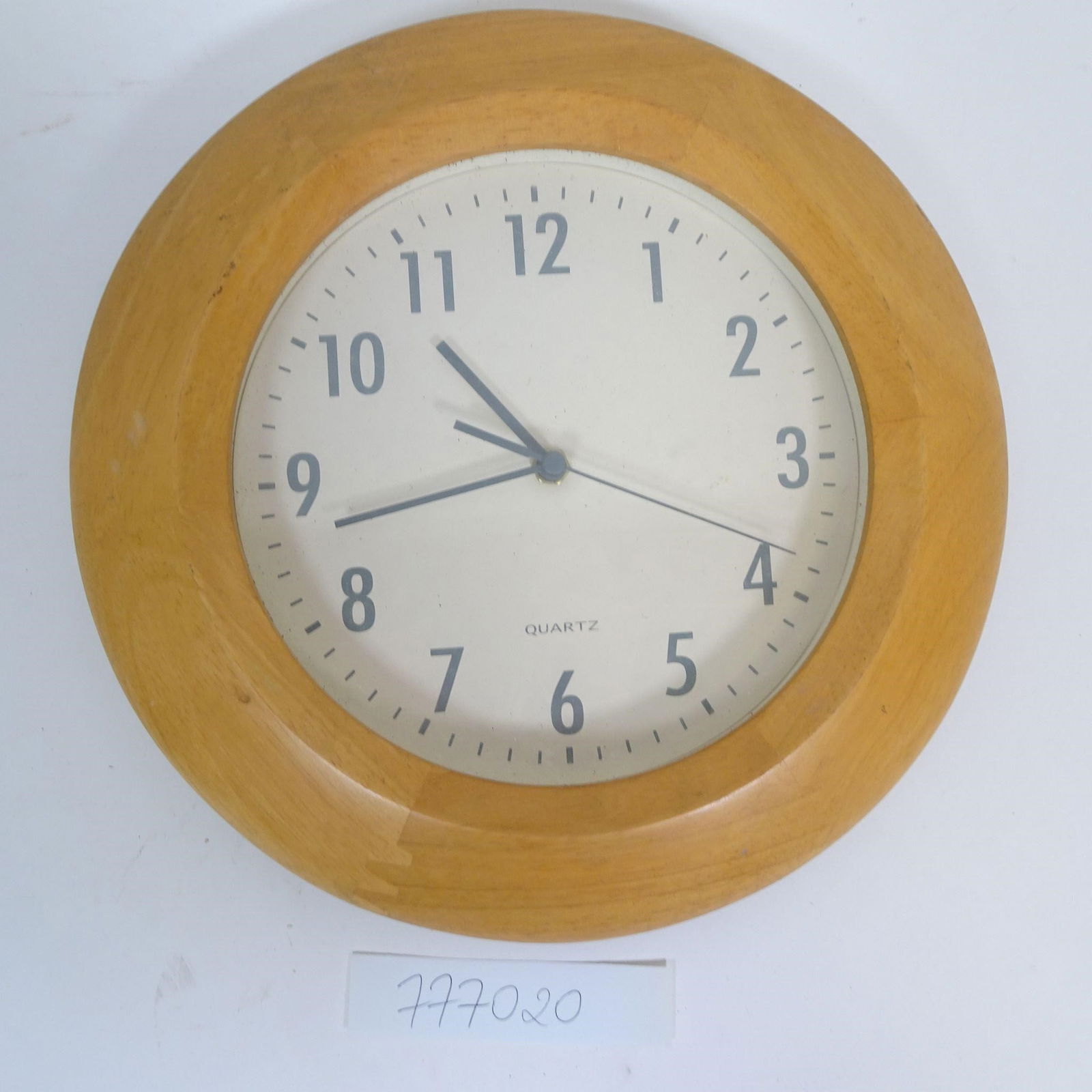 Wood Framed Quartz Wall Clock: Classic round wall clock with a light wood frame and clean white dial featuring Arabic numerals. Simple, timeless design with quartz movement. Suitable for kitchen, living room, office, or vintage-ins