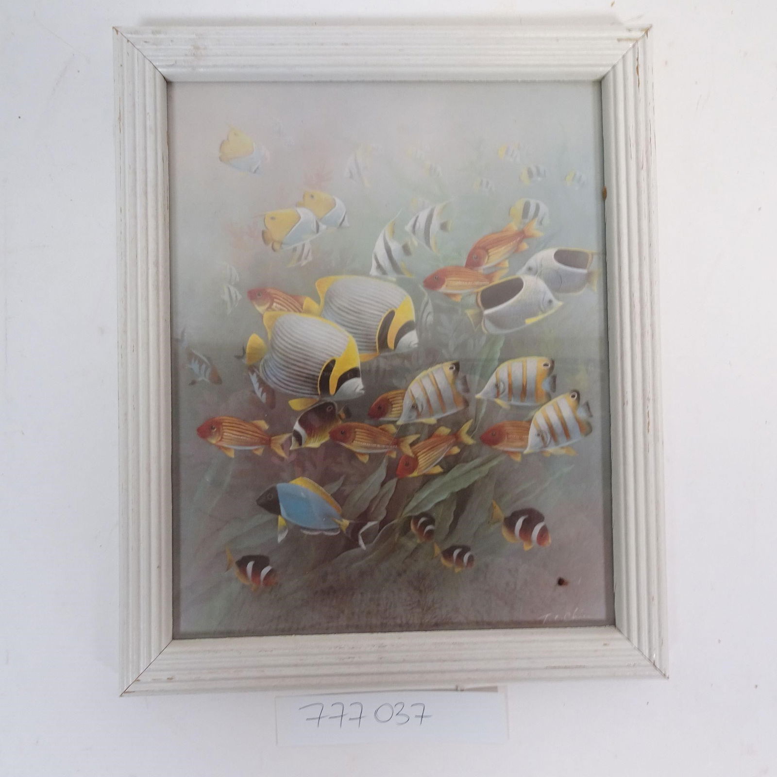 Framed Tropical Fish Underwater Scene Print: Decorative framed wall art featuring a colorful underwater scene with tropical fish.The artwork depicts a variety of vibrant fish swimming among aquatic plants, creating a calm and coastal