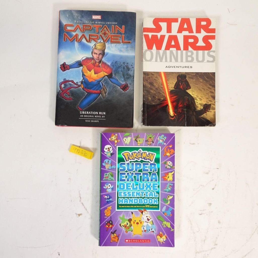 Book Lot: This listing features a lot of 3 pop-culture books, sold together as one complete set: - Captain Marvel: Liberation Run - Marvel universe novel - Star Wars Omnibus: Adventures - collected comic editio