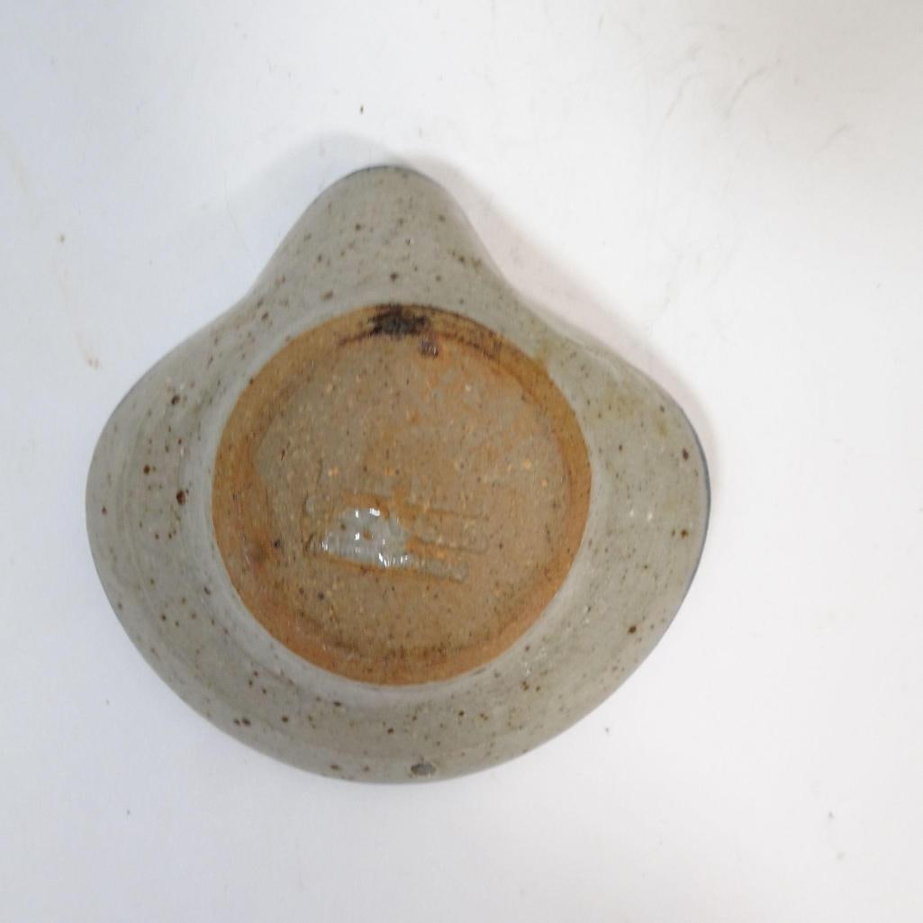 Decorative Set: The ceramic dish features a rustic glaze with natural speckling and a hand-painted blue botanical pattern. The glass candle holder has a solid, textured form that reflects light beautifully, making it