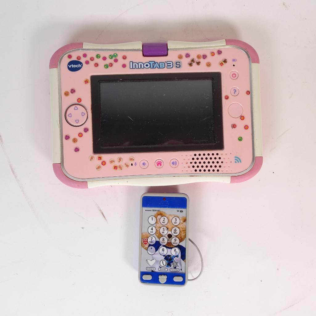Educational Toys Lot: Fun educational electronics bundle for kids featuring a pink VTech InnoTab 3S learning tablet and a cute pretend play phone. Perfect for parents, resellers, or toy collectors looking for educat