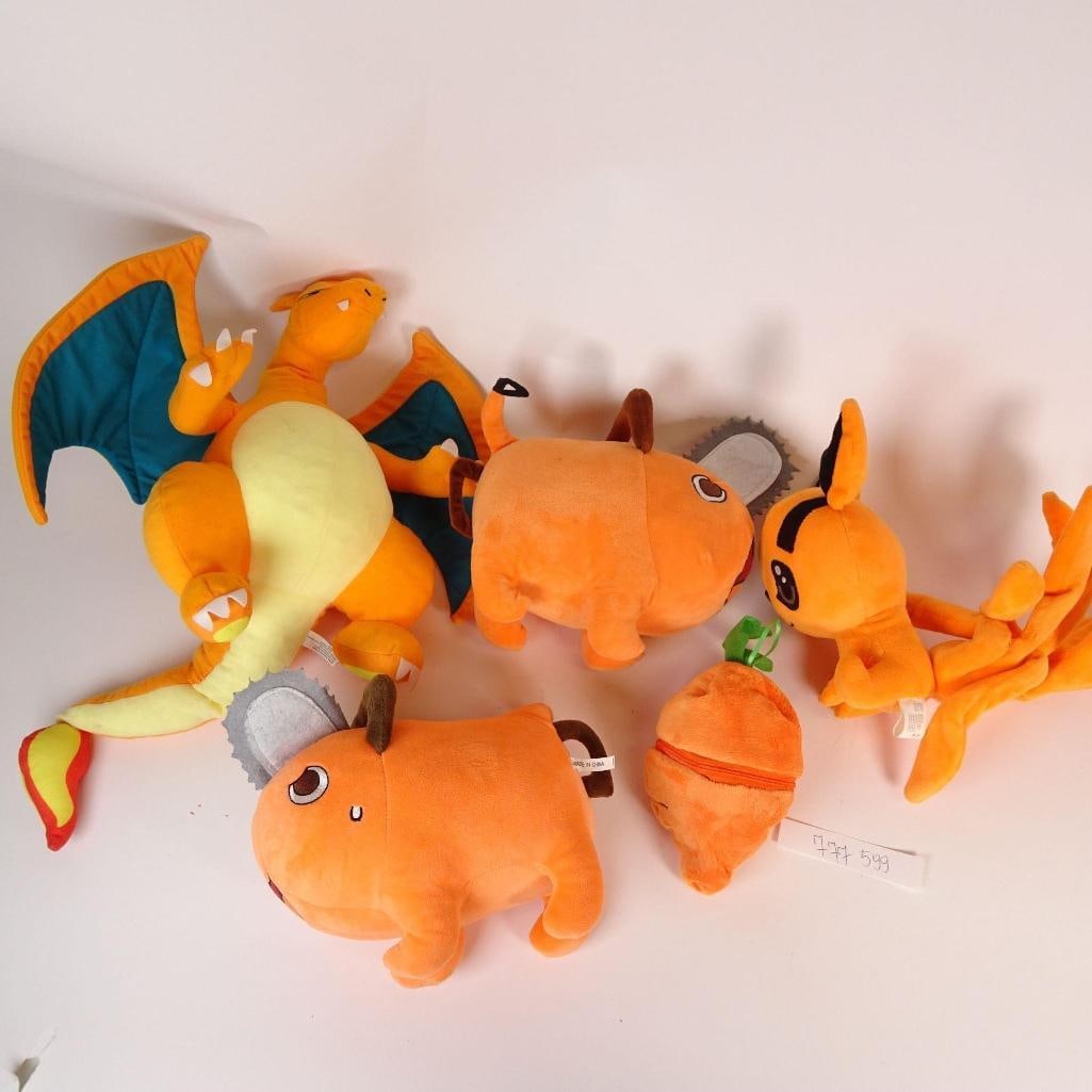 Pokémon Plush Lot: his lot features a Pokamon-themed plush collection, primarily in orange tones, including recognizable characters such as Charizard and harmander, along with additional Pokamon plush figures.