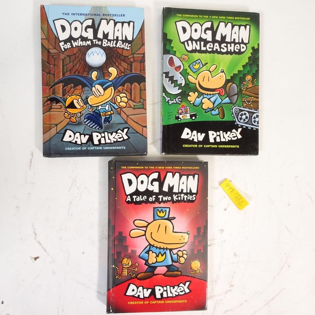 Dog Man Book Lot: This listing features a set of 3 Dog Man books by bestselling author Dav Pilkey: - Dog Man: For Whom the Ball Rolls - Dog Man: Unleashed - Dog Man: A Tale of Two Kitties Condition: pre-owned, with typ