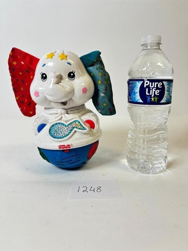 Fisher Price Sparkaling Symphony Twinkle Dancer Elephant: Fisher-Price Sparkling Symphony Twinkle Dancer Elephant ?? Interactive musical toy with lights and movement. Condition varies; please refer to photos for details.