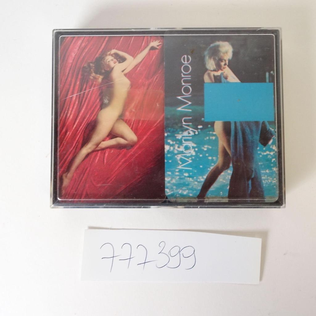 Marilyn Monroe Playing Cards: Offered for auction is a collectible playing card deck featuring iconic images of Marilyn Monroe. Each card showcases classic pin-up and Hollywood glamour photography, making this set both functional