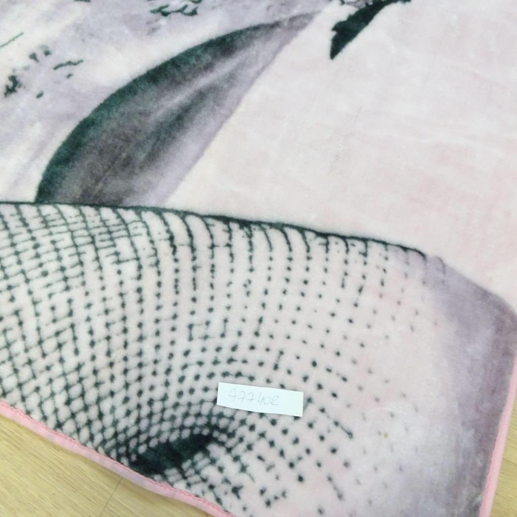 Marilyn Monroe Licensed Throw Blanket: Decorative throw blanket featuring the iconic image of Hollywood legend Marilyn Monroe. Officially licensed item, manufactured by JP Imports (Los Angeles). Image based on a photograph by Milton H. Gre