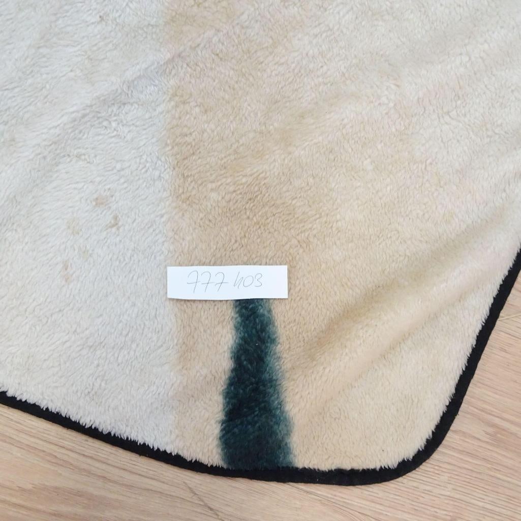 Marilyn Monroe Licensed Throw Blanket: Decorative licensed throw blanket featuring Hollywood icon Marilyn Monroe. Produced under the Bernard of Hollywood brand, officially licensed. Bold graphic design with black background and iconic red