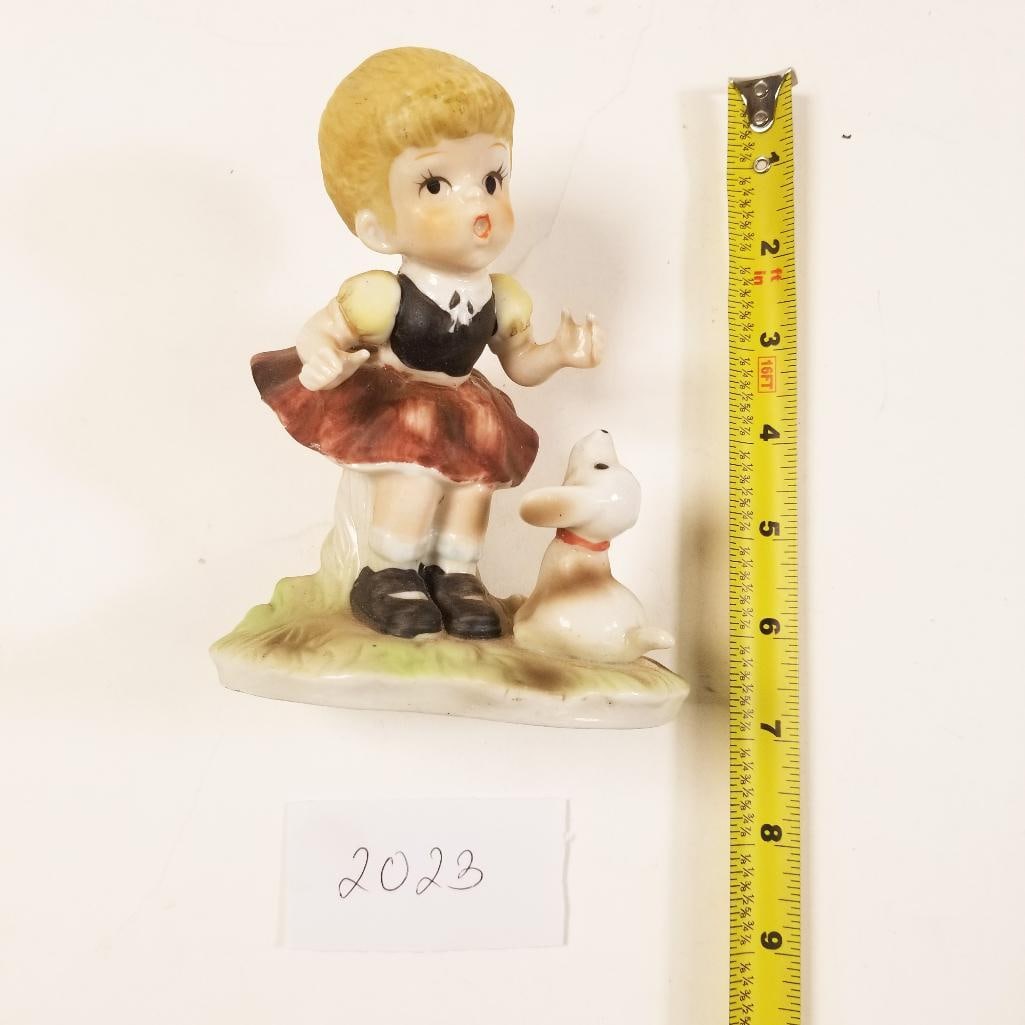 Girl With Dog Figurine: Girl With Dog Figurine. Adorable figurine. No chips or cracks.