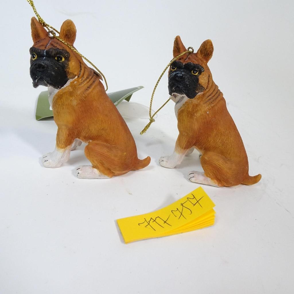 Hand-Painted Resin Figurines: Charming set of two Boxer dog ornaments made of hand-painted resin. Realistic detailing and warm brown tones, each with a hanging cord-perfect for holiday décor, dog lovers, or collectible displays.