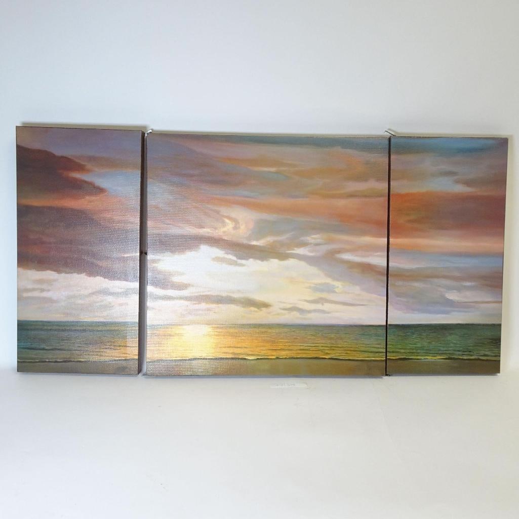 Large Seascape Sunset Triptych: Beautiful large triptych canvas wall art depicting a serene ocean sunset landscape. The artwork is composed of three separate canvas panels that together create one cohesive panoramic scene. Warm tone