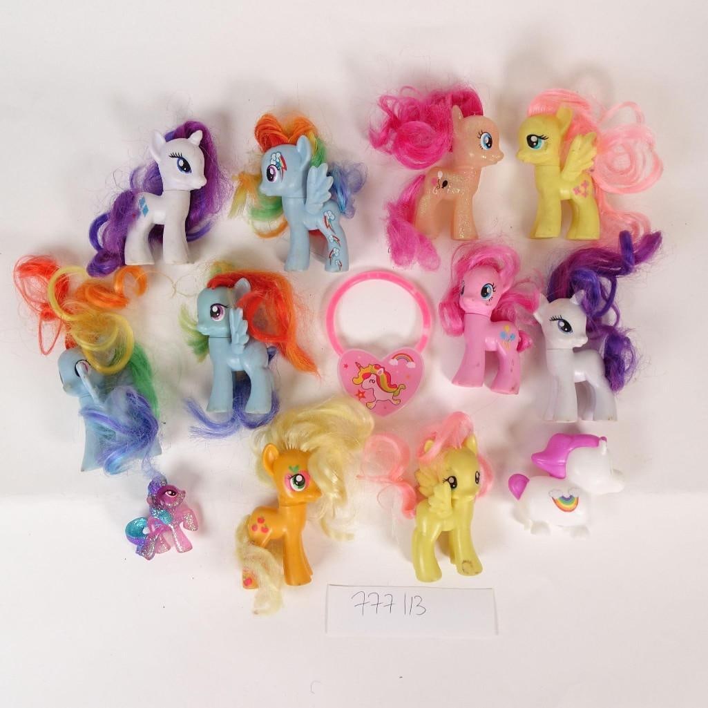 My Little Pony Figure Lot - 13 pcs + Accessories: Lot of My Little Pony figures. Includes:-13 My Little Pony figures-accessories (as shown in photos, including small bag/lock)