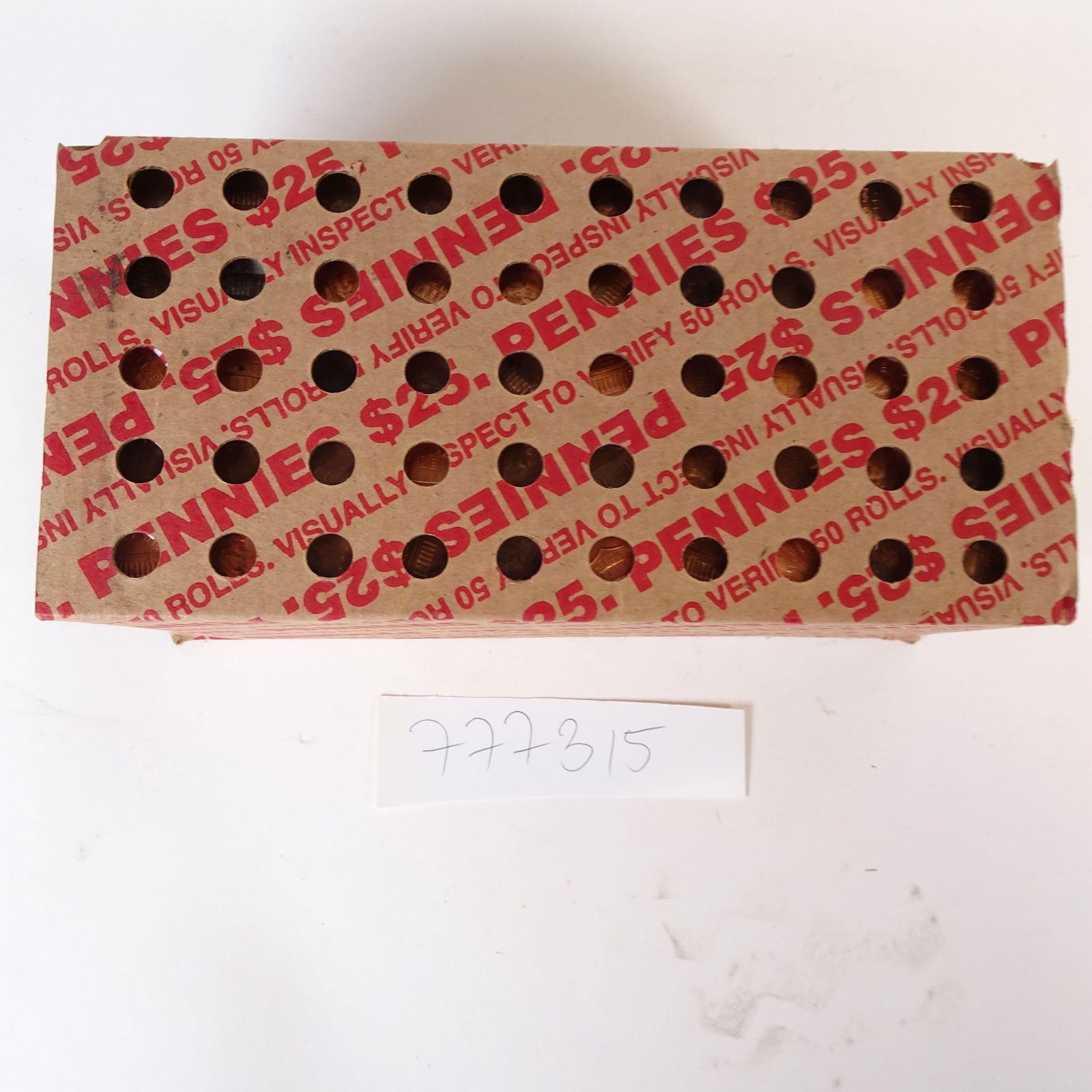 Unsearched Lincoln Pennies Bank Box: This auction features a full vintage bank box of U.S. pennies with a $25 face value, equivalent to 50 original rolls of Lincoln cents. The box is marked "Pennies - $25 - Verify 50 Rolls - Visually Ins