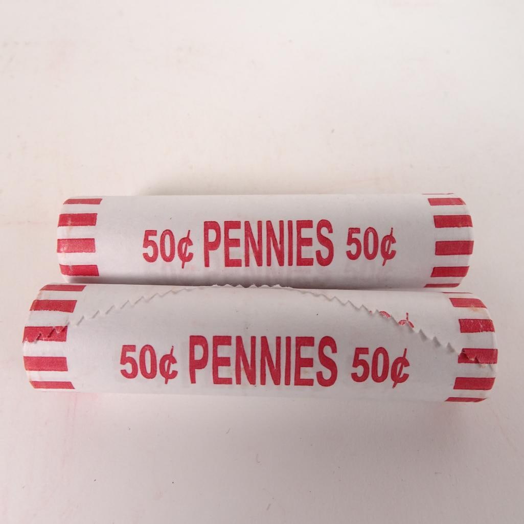 2 Bank Wrapped Penny Rolls: Lot of 2 bank-wrapped rolls of U.S. Lincoln pennies (50¢ each roll). Coins remain sealed in original paper wrappers as shown in photos. Great addition for coin collectors, beginners, or anyone who en