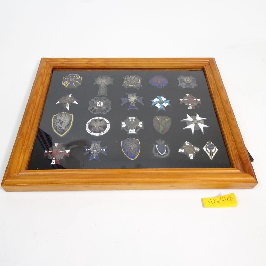 Historic Collection of Medals: An exceptional historic collection of original medals and badges, displayed in a wooden glass-front frame. The set originates from a family collection and is traditionally attributed to Marshal