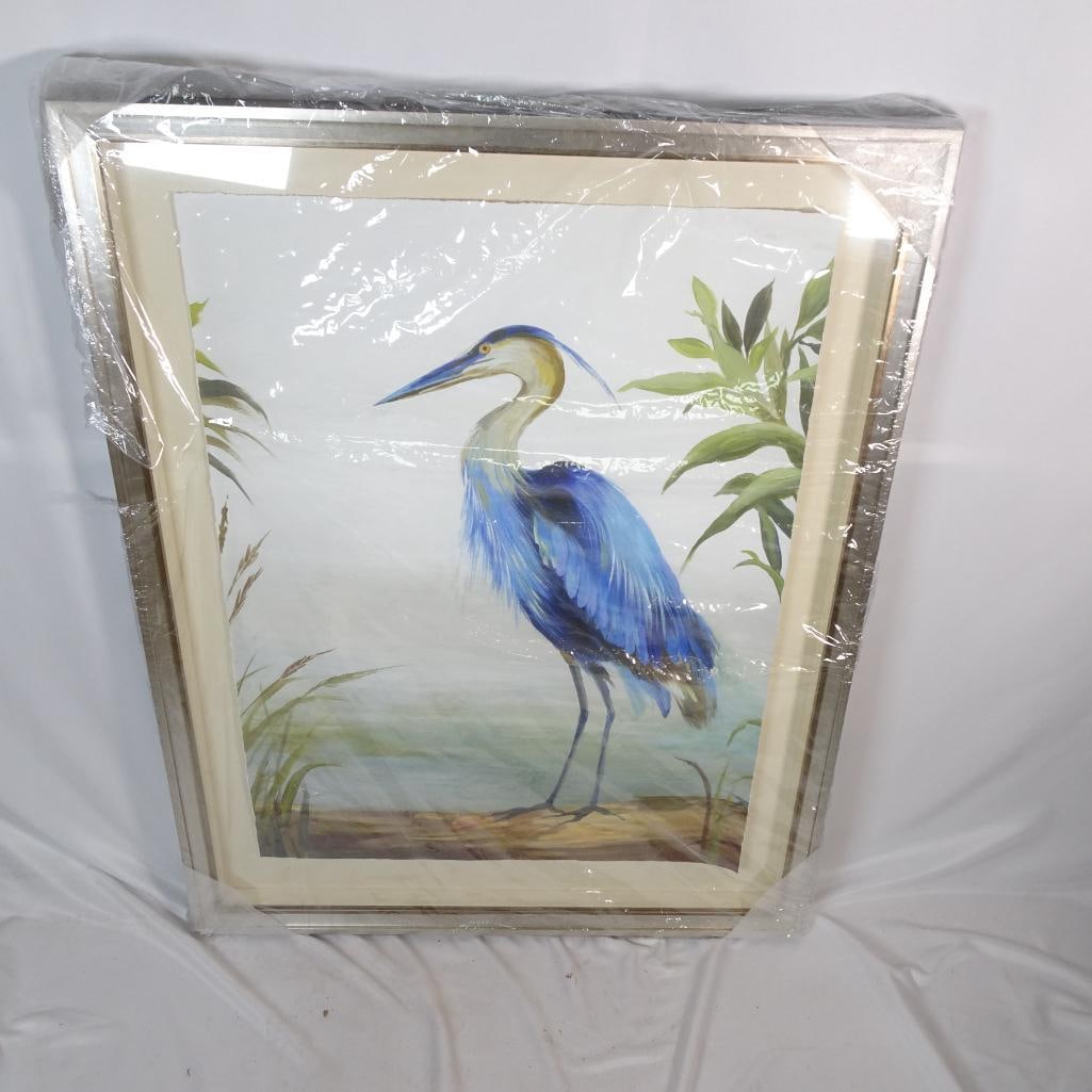 Large Blue Heron Coastal Wall Art: Large framed Blue Heron coastal wall art by Paragon Picture Gallery. Features a beautiful blue heron standing near water with soft neutral background tones. Framed and ready to hang. Perfect for coast