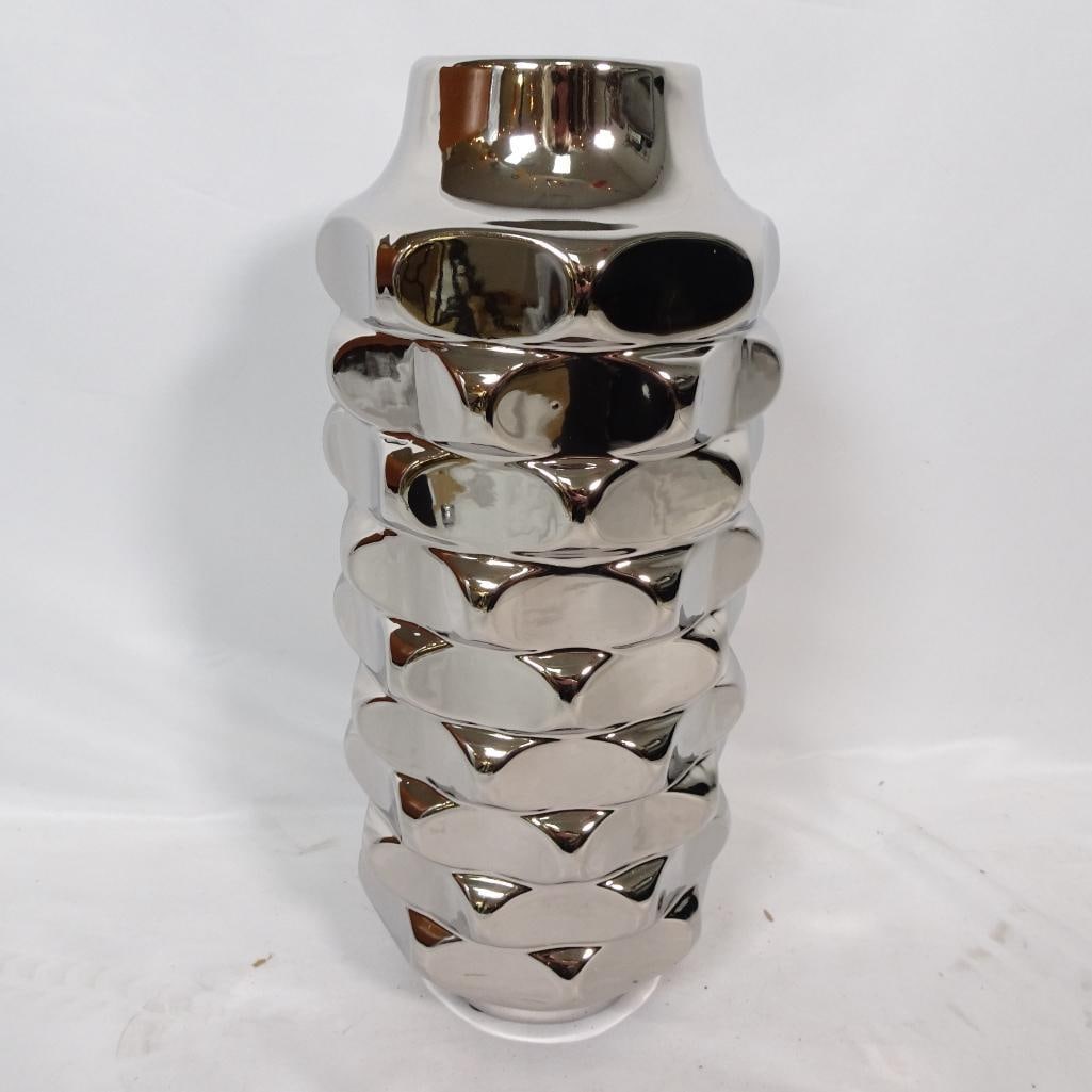 Large Modern Silver Sculptural Vase: Striking modern sculptural vase featuring a high-gloss chrome silver finish and bold dimensional bubble-style design. This statement piece reflects light beautifully and works perfectly in contemporar