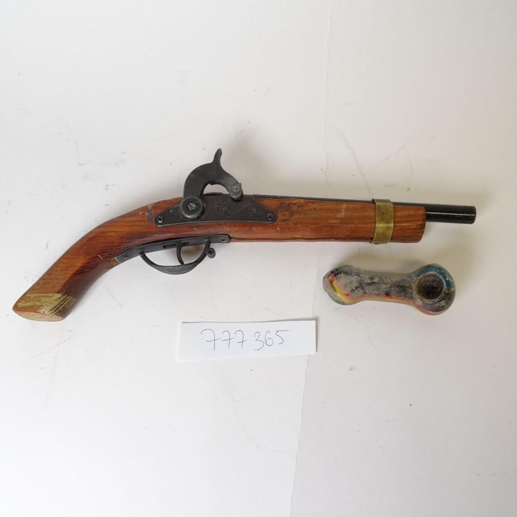 Vintage Flintlock Pistol Replica & Glass Hand Pipe: Mixed lot featuring two items sold together as one lot. Both items show clear signs of age and use, including surface wear, scuffs, discoloration, and residue (see photos). Items are sold as-is,