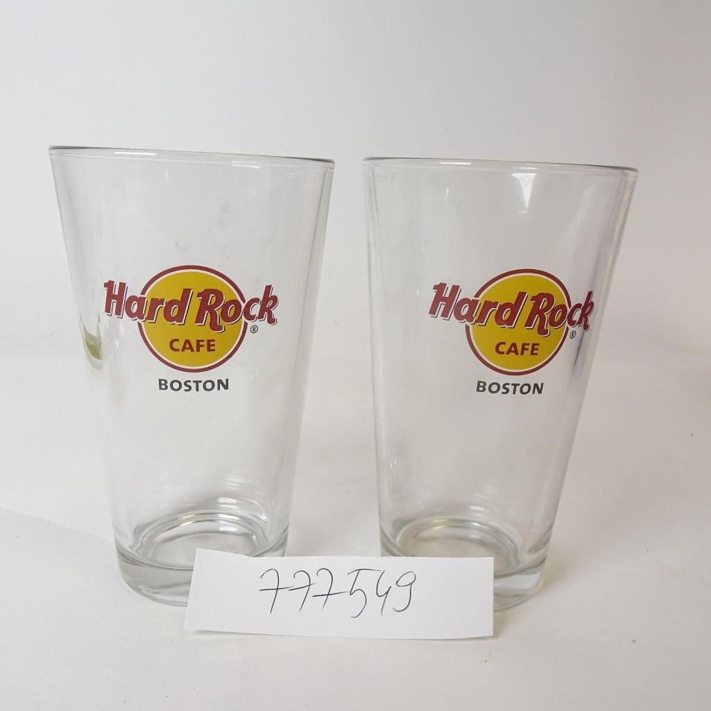 Hard Rock Cafe Boston Pint Glasses (2): Set of two original souvenir pint glasses from Hard Rock Cafe Boston. Clear glass with classic logo, approx. 7 inches tall. Great for collectors, home bars, or Hard Rock fans.