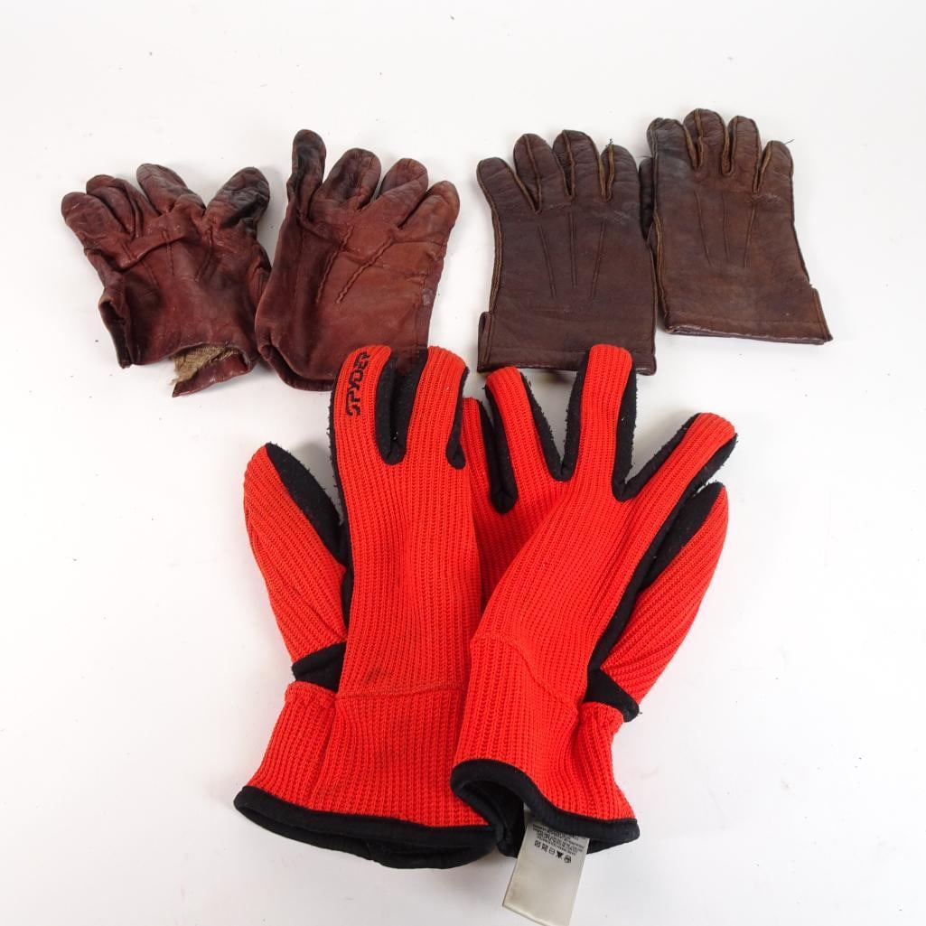 Mixed Lot Work Gloves: Mixed lot of assorted work and winter gloves including leather gloves and insulated cold-weather gloves. Great bundle for outdoor work, garage use, yard work, or winter activities. Included in this