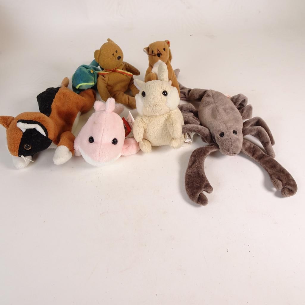 7_ Mini Plush Animal Lot: A fun and colorful 7_plush animal bundle featuring a variety of soft, adorable characters. All toys are gently used and perfect for play, gifting, or adding charm to a plush collection.