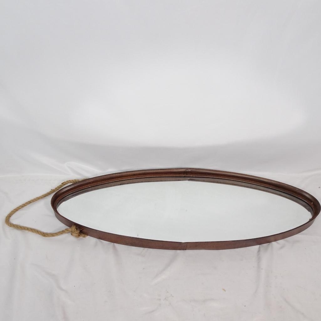 Rustic Oval Hanging Mirror with Rope: A stylish, elongated oval wall mirror featuring a rustic wooden frame and a thick rope hanger for easy mounting. The mirror measures approximately 36 inches in length and 11 inches in height, making i