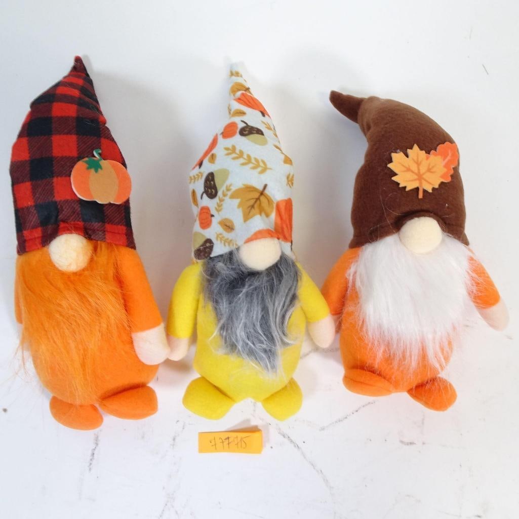 Set of 3 Autumn Gnomes: Charming set of three decorative autumn gnomes, sold together as one lot. Each gnome features a unique fall-inspired design. Made of soft textile materials with fluffy beards and freestanding bases. P