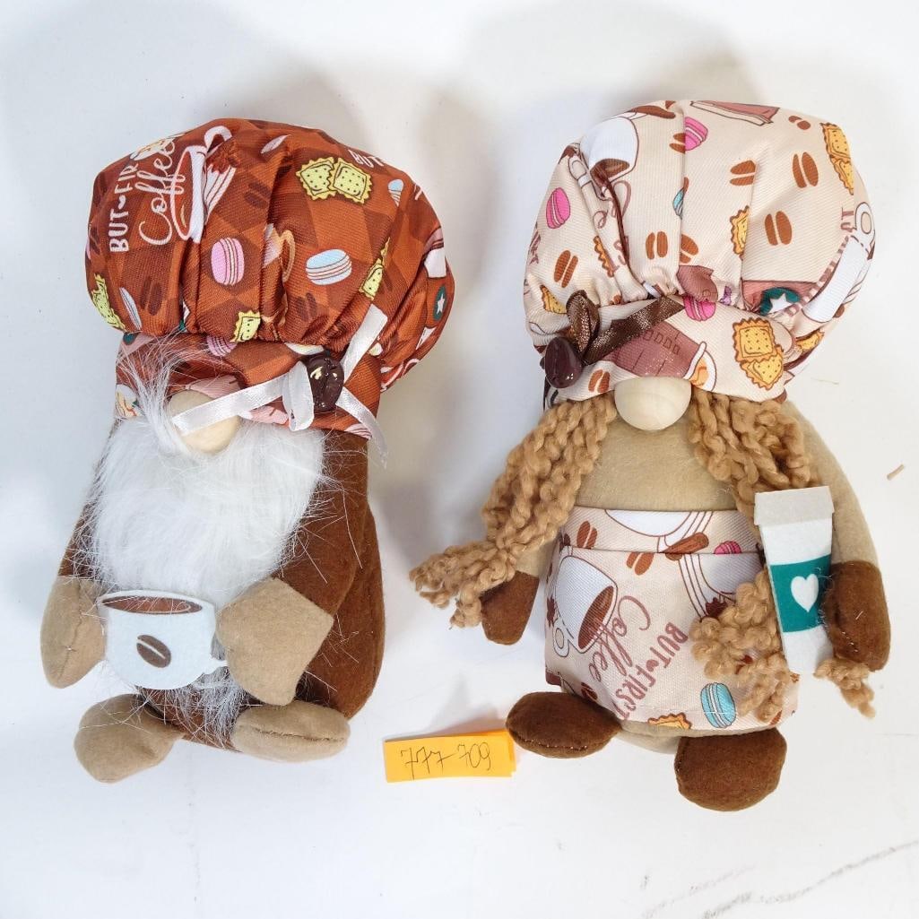 Set of 2 Decorative Coffee Gnomes: Charming set of two decorative gnomes designed in a cozy coffee theme. Each gnome features coffee-inspired details including patterned hats and outfits with cups, cookies, and coffee beans. One gnome