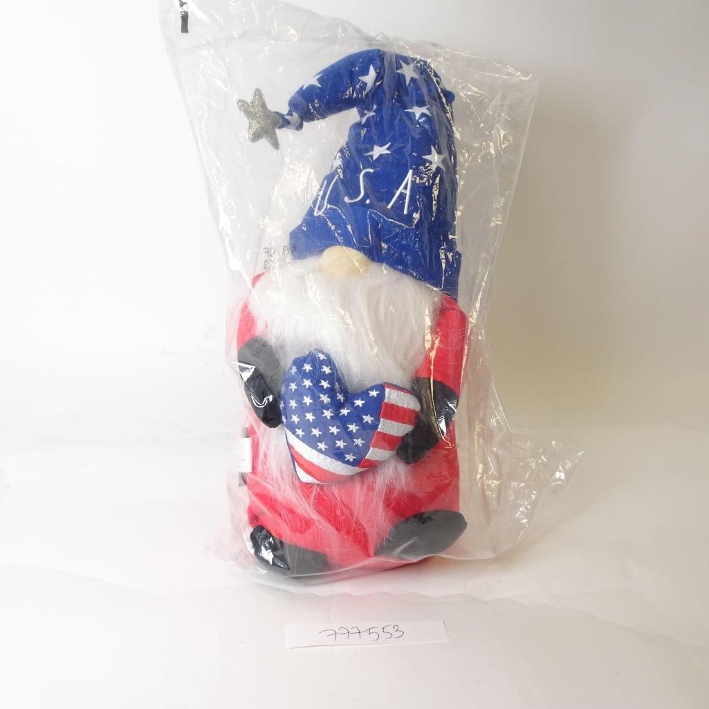 Patriotic USA Gnome Plush Decoration: Soft patriotic gnome plush in red, white, and blue colors. Features a long star-patterned hat and heart detail. New in original packaging, perfect for 4th of July or Americana décor.