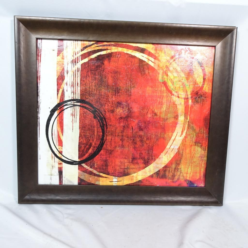Abstract Red Orange Framed Wall Art: Large framed abstract wall art featuring bold red and orange tones with circular geometric elements. Approximate size: 30? x 24? Brand: Art Classics Ltd. Style: Modern / Contemporary Features: ? Bold