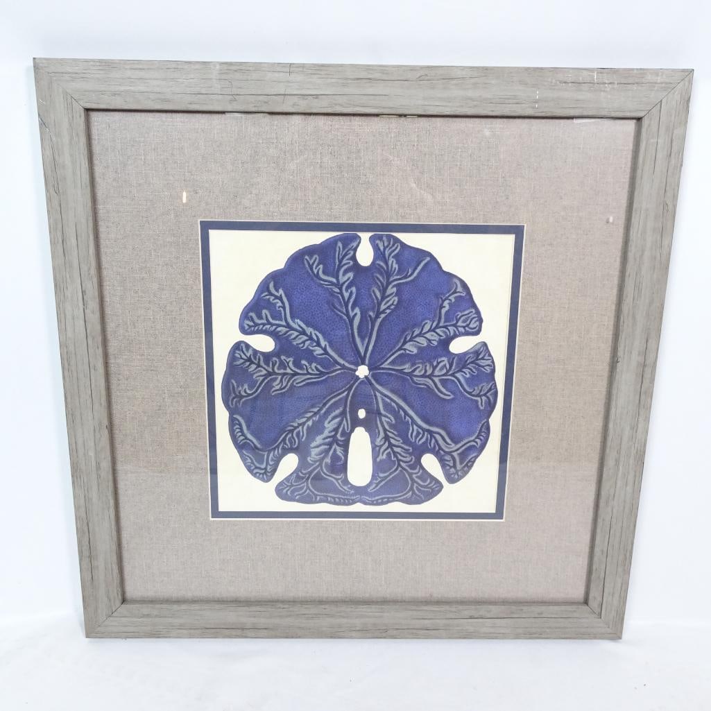 Coastal Blue Sand Dollar Wall Art Framed Print: Beautiful coastal-inspired framed wall art featuring a blue sand dollar design titled ?Sea Life IV.? The artwork presents a classic nautical aesthetic, perfect for beach house, coastal, Hamptons, or m