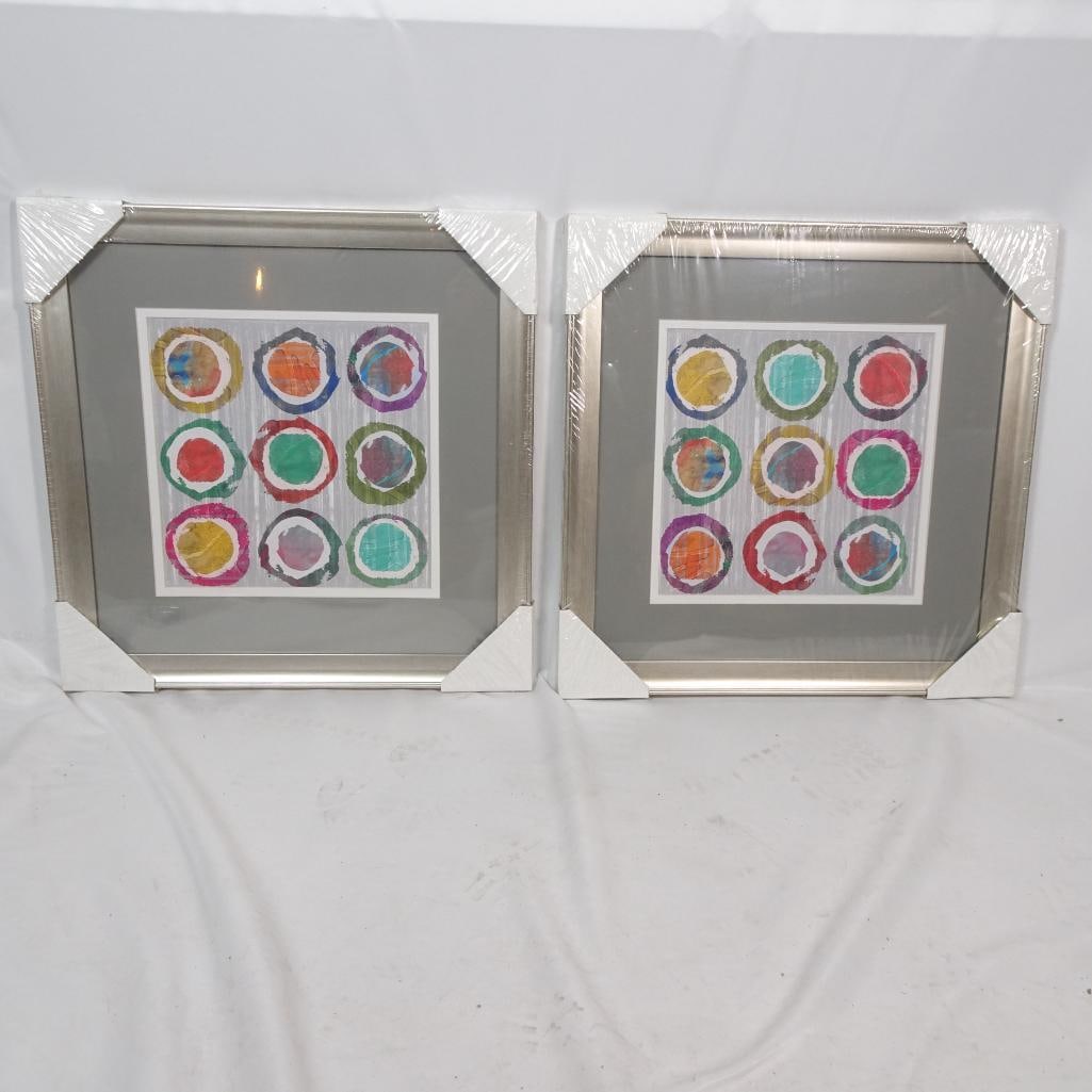 New Set of 2 Abstract Circle Art Prints: A brand_new, factory_wrapped set of two modern abstract artworks featuring vibrant circular designs arranged in a clean grid layout. Each piece includes layered rings of bold colors on a soft gray bac