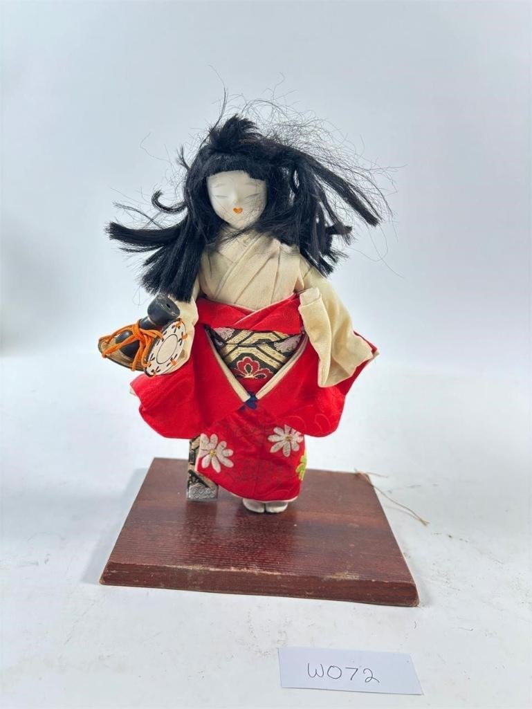 Vintage Japanese Geisha Nishi Doll on Stand: Vintage Japanese Geisha Girl on Stand -Sold as-is, condition varies. See photos for details.