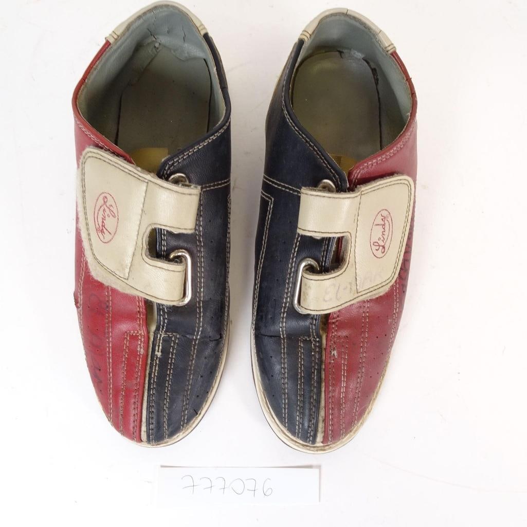 Vintage Lind Bowling Shoes: Original vintage Lind bowling shoes featuring a classic red, white, and blue leather design.These shoes show visible signs of age and use, including scuffs, discoloration, writing marks, and wear to t