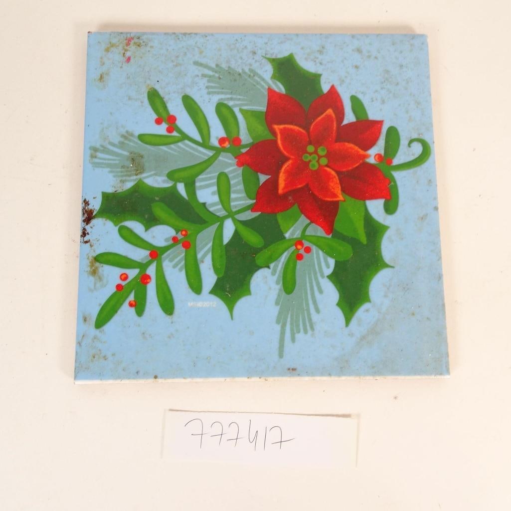 Vintage Christmas Ceramic Tile with Poinsettia: Vintage square ceramic tile featuring a Christmas poinsettia (Christmas star) design on a light blue background. Bright festive colors with classic holiday charm.